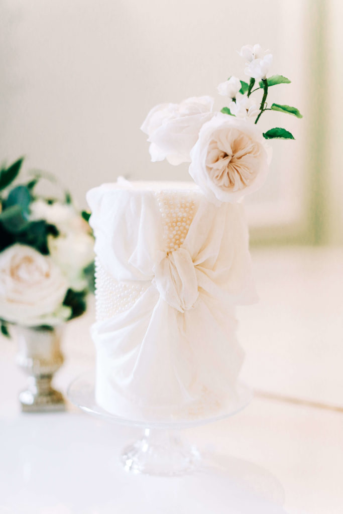 Berkshire white wedding cake with bow detail 
