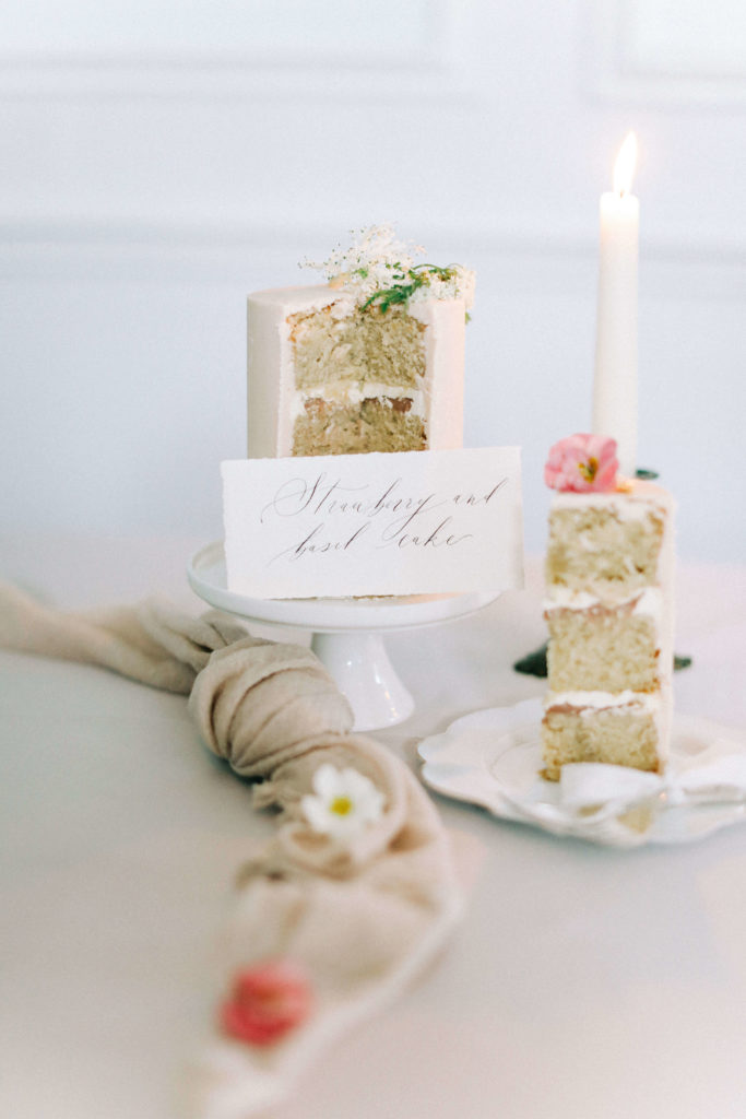Vanilla strawberry and basil wedding cake slice