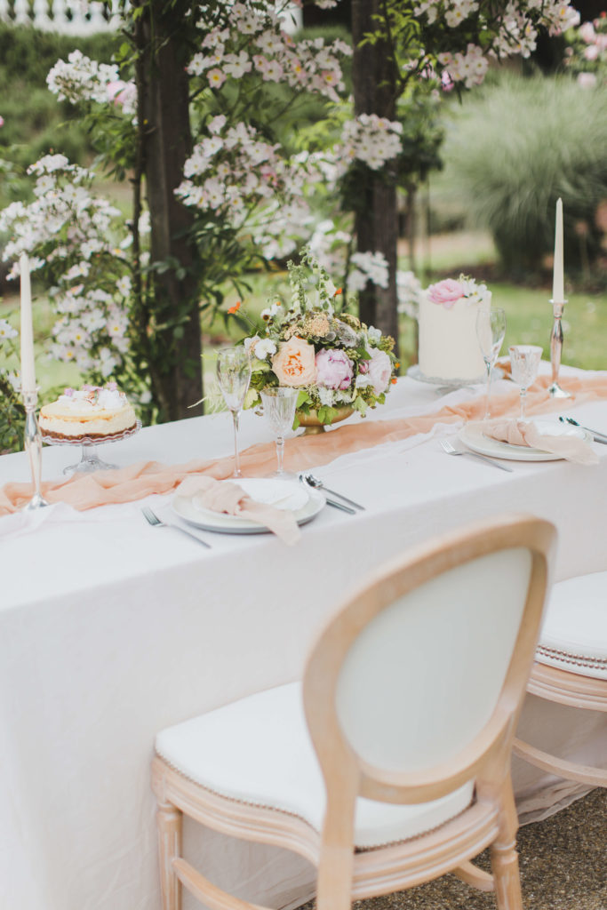 Intimate wedding table cape at Coworth Park